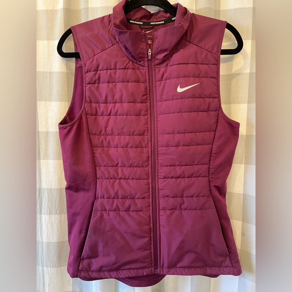 Nike Women's Quilted Plum Sleeveless Vest with White Swoosh